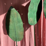 Large decorative metal palm leaf from Dior show mid 90s. 3 available
