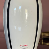 Pair of 1980s Italian G G Luce white ceramic lamps with black stripe