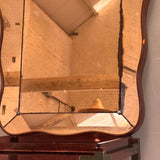 1930s Italian chunky peach wood framed wavy mirror