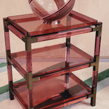 Rare 1960s Italian raspberry peach lucite and brass shelving unit by Sharra Pagano
