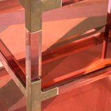 Rare 1960s Italian raspberry peach lucite and brass shelving unit by Sharra Pagano