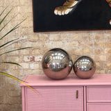 Set of two 1970s decorative mirrored balls.
