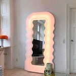 Ultrafragola Mirror by Ettore Sottsass- lighting up a living room