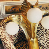 Huge 1970s brass palm wall light