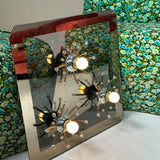 Italian 1970s starburst mirrored wall light