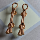 Pair of large push and pull rope and tassel effect solid brass door handles. Italian 1950s