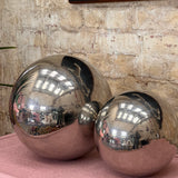 Set of two 1970s decorative mirrored balls.