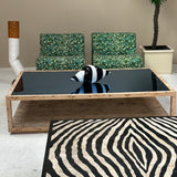 Large Italian burr wood coffee table with blue mirror top.