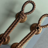Pair of large push and pull rope and tassel effect solid brass door handles. Italian 1950s