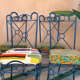 Set of four midcentury blue iron garden chairs