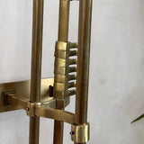 Beautiful 1950s brass rail shelf and hooks.