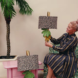 1970s pair of Tomasso Barbi leaf wall lights with leopard print shades