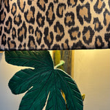 1970s pair of Tomasso Barbi leaf wall lights with leopard print shades