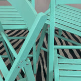 1980s Italian set of four mint green wood folding chairs