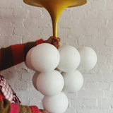 Rare Kaiser Leuchten yellow metal pendant light 10 globe C.1960