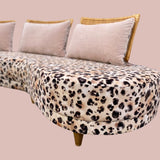 1980s large leopard print Harrods curved sofa