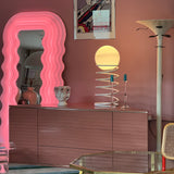 Pink 1970s triangular cabinet by Roger Rougier