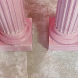 Pair of large pink plaster pillars. Italian 1980s