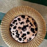 Round wicker leopard print footstool