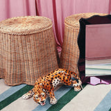 Trompe L’oeil draped wicker side table