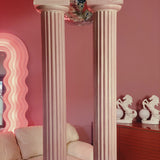 Pair of large pink plaster pillars. Italian 1980s