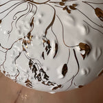 white and gold vintage ceramic lamp