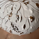 white and gold vintage ceramic lamp